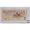 Image 3 : Canada Bills (3): - 1973 $1 : Crow/Bouey #BFC6126067 - 1986 $2 : Thiessen/Crow #CBE7820390 - 2006 $5