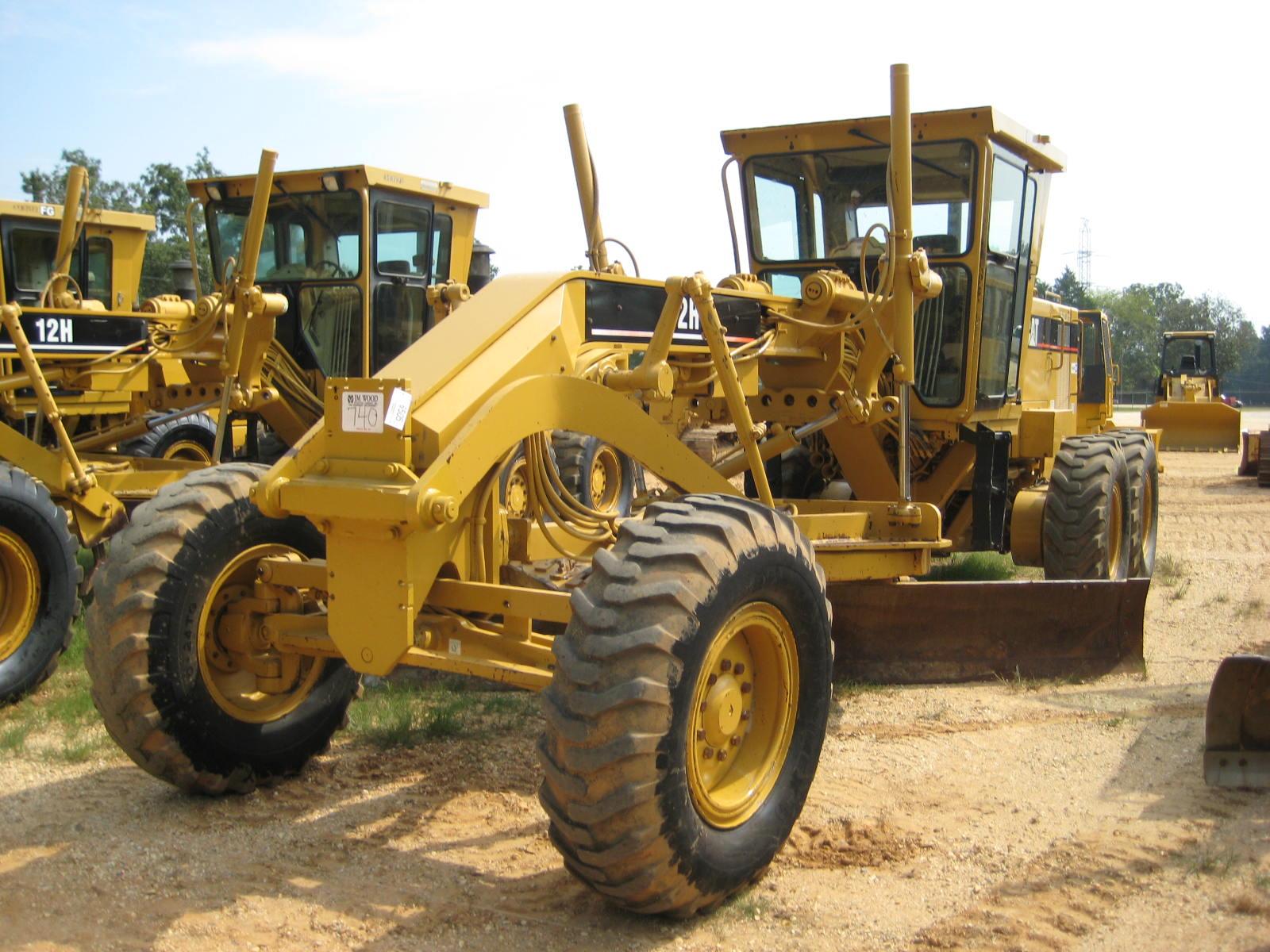 CAT 12H MOTOR GRADER J.M. Wood Auction Company, Inc.