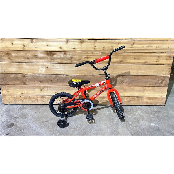 HUFFY RED CHILDRENS BIKE WITH TRAINING WHEELS