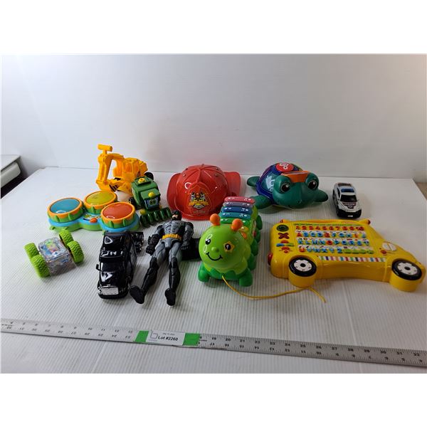 Toy Lot- Batman Figurine, Firefighter Hat, Interactive Learning Toys, Misc.