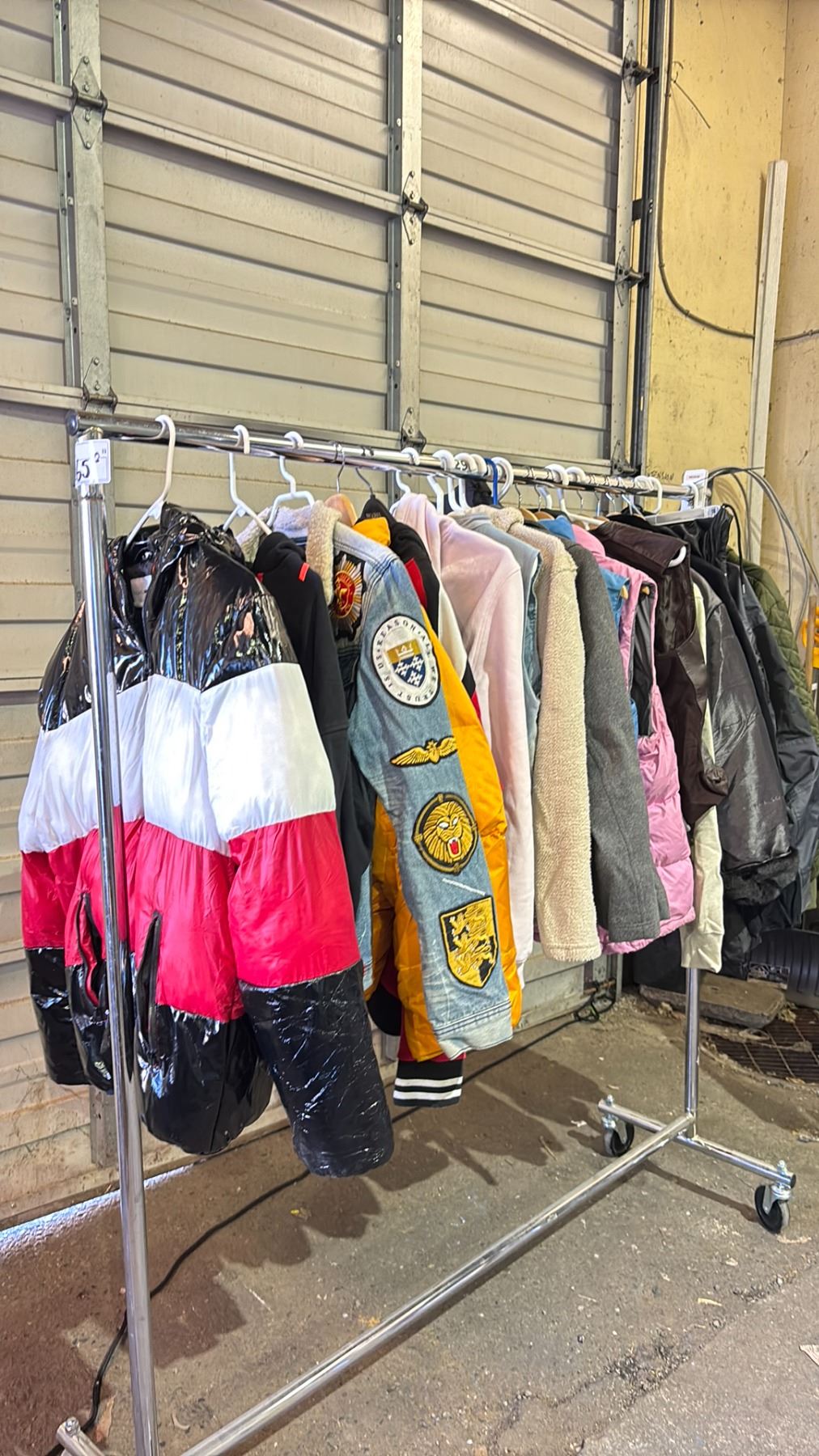 RACK OF ASSORTED MENS & WOMENS CLOTHING *RACK NOT INCLUDED* - Able Auctions