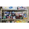 Image 1 : SHELF OF ASSORTED TOYS INCLUDING; RC MONSTER TRUCKS, STITCH STUFFY, MONSTER JAM SUPERCHARGE