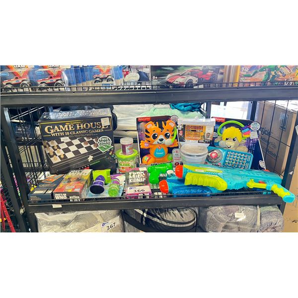 SHELF OF ASSORTED TOYS & GAMES INCLUDING; WATER GUNS, GAME HOUSE, BUBBLE GUNS & MORE