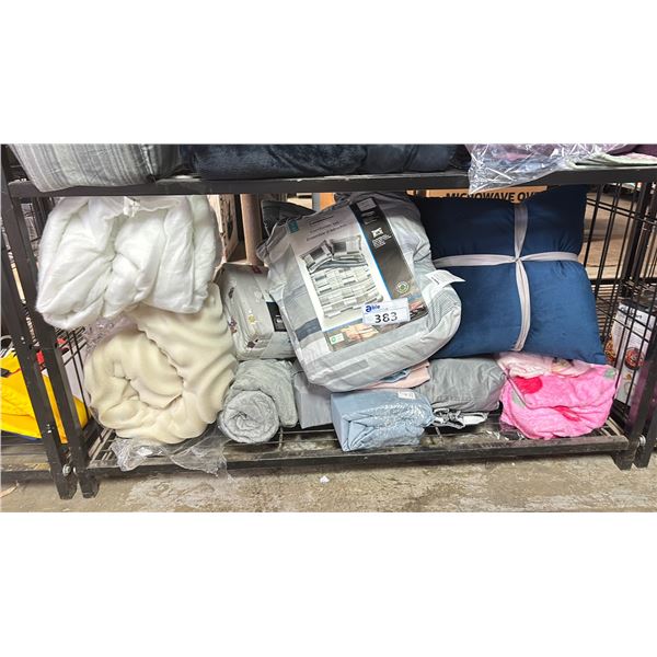 SHELF OF ASSORTED BEDDING