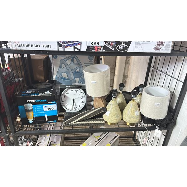 SHELF OF ASSORTED ITEMS INCLUDING; ZERO WATER FILTRATION SYSTEM, WALL CLOCKS, TABLE LAMPS & MORE