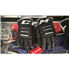 Image 2 : PAIR OF ROAD WARRIOR STREET HOCKEY GOALIE LEG PADS & 2 PAIRS OF CCM STREET HOCKEY JUNIOR GLOVES