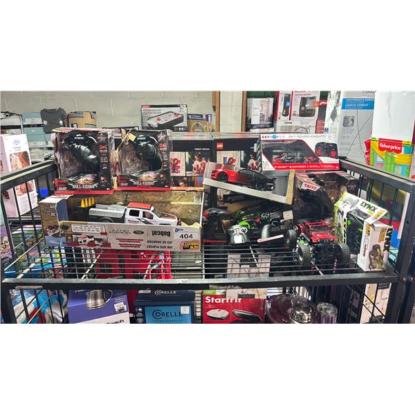 SHELF OF ASSORTRED TOYS INCLUDING; RC CARS & RC BULL RIDING SHOWDOWN