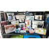 Image 1 : SHELF OF ASSORTED ITEMS INCLUDING; STEAM IRON, BEAUTIFUL CAST IRON DUTCH OVEN, MAINSTAYS 4L DEEP