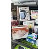 Image 2 : SHELF OF ASSORTED ITEMS INCLUDING; STEAM IRON, BEAUTIFUL CAST IRON DUTCH OVEN, MAINSTAYS 4L DEEP