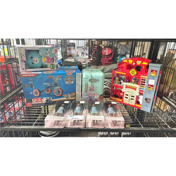 SHELF OF ASSORTED ITEMS INCLUDING; HUFFY PAW PATROL LIGHT-UP KIDS TRIKE, FIRE STATION TOY WITH