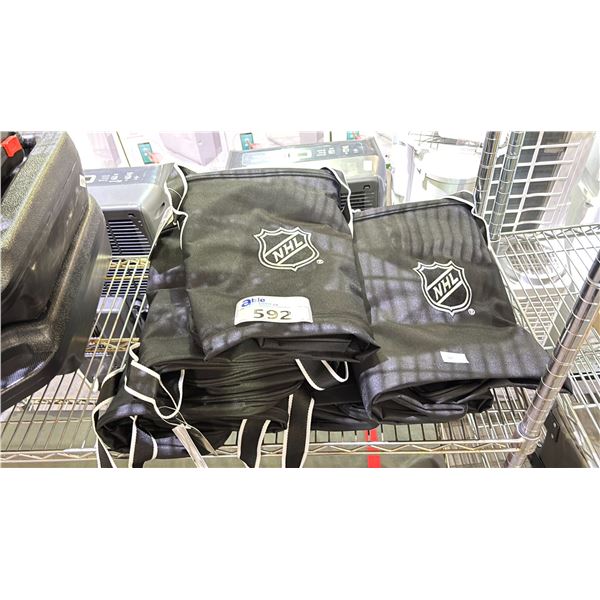 STACK OF NHL 30" X 15" X 12" HOCKEY BAGS