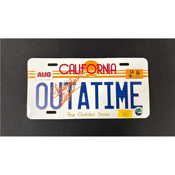 BACK TO THE FUTURE LICENSE PLATE AUTOGRAPHED BY CHRISTOPHER LLOYD