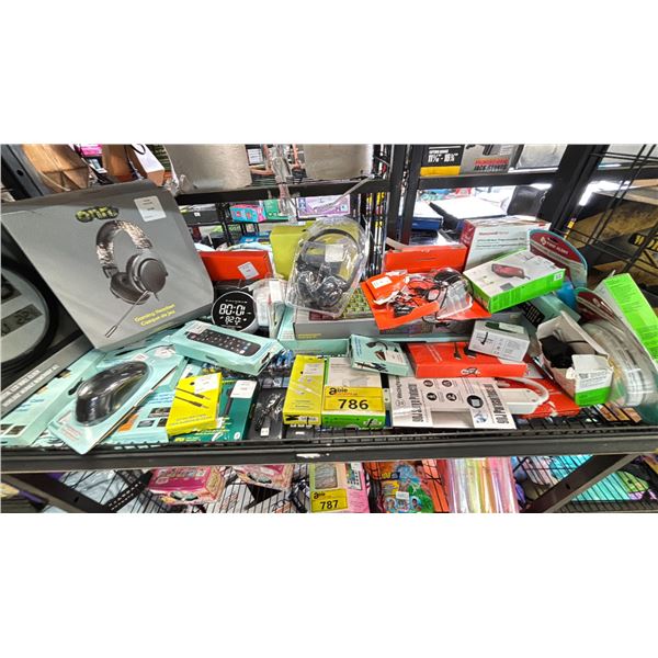 SHELF OF ASSORTED ITEMS INCLUDING; LED GAMING KEYBOARD, ONN. GAMING HEADSET, WIRELESS CHARGING PAD