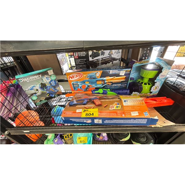 SHELF OF ASSORTED ITEMS INCLUDING; NERF GUNS, BIONIC HAND & GAZILLION BUBBLES MACHINE