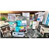 Image 1 : SHELF OF ASSORTED ITEMS INCLUDING; BUBBLE BLISS DELUXE FOOTBATH, MINI IRON, HAND-HELD STEAMER &