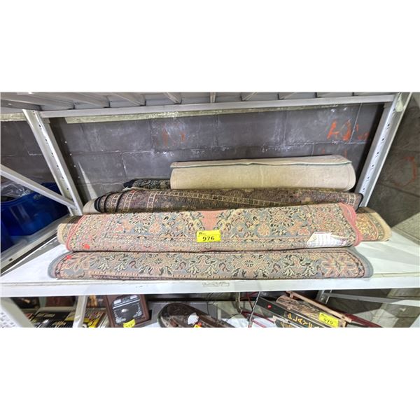 SHELF OF ASSORTED AREA RUGS