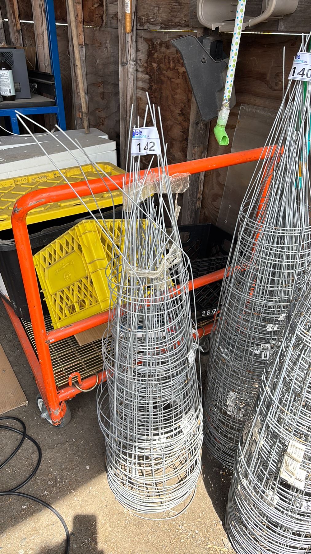 STACK OF GALVANIZED TOMATO CAGES - Able Auctions