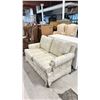 Image 2 : BEIGE COUCH WITH FLORAL PATTERN