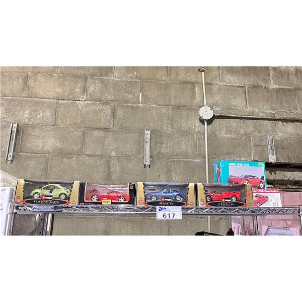 SHELF OF ASSORTED MODEL CARS
