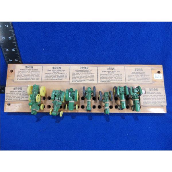 7 Miniature John Deere Tractors on Wood Display with Info