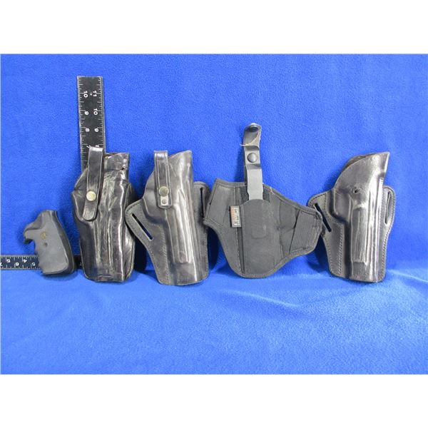 4 Leather Holsters and a Pachmayr Colt I Pistol Grip