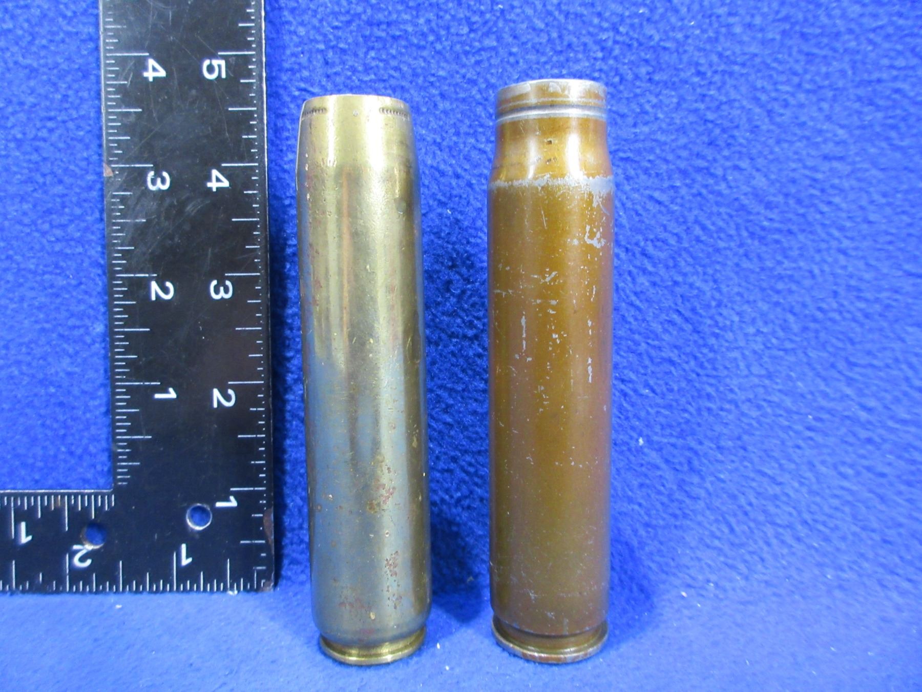 2 - 20MM Shell Casings - 1 Brass (1942) and 1 Steel (1943)