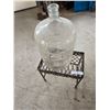 Image 2 : Decorative Metal Plant Stand & Lg Glass Bottle.  Stand  17 w, 15 h, 11 d.  Bottle 7 dia18 1/2 h