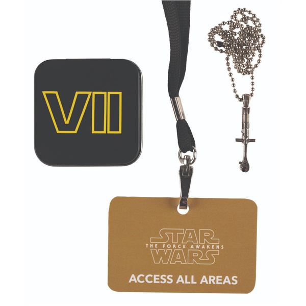 A "The Force Awakens” Crew Gift Pendant with an All-Access Pass.