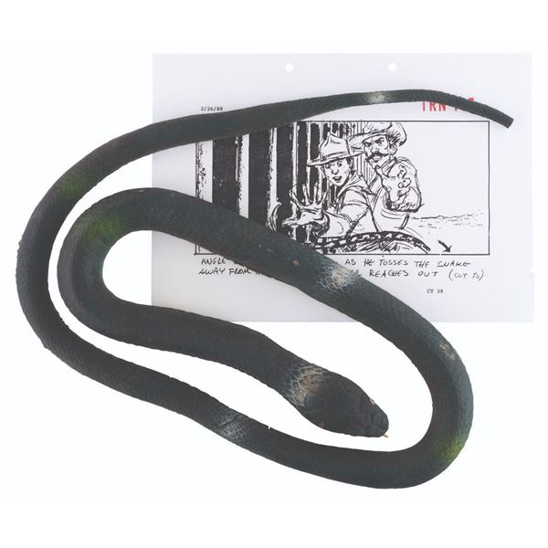 A "The Last Crusade" Prop Snake and Storyboard Page.