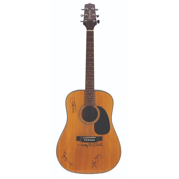 An Eagles Signed Acoustic Guitar.