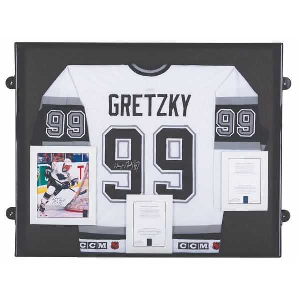 A Wayne Gretzky Signed Jersey and Photo.