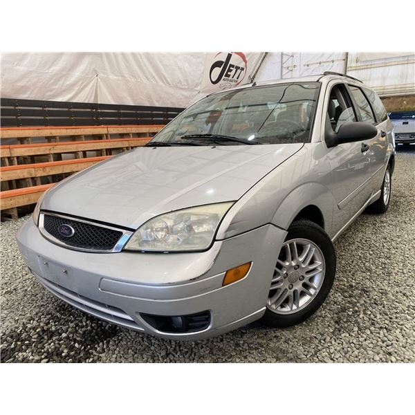 10 -- 2005 FORD FOCUS, SILVER, 254082 KMS, FRONT WHEEL DRIVE