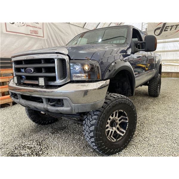154 -- 2004 FORD F350, BLUE, 292995 KMS, 4X4