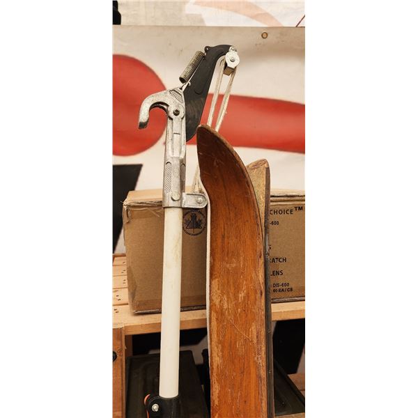 942 -- FISKARS BRANCH PRUNER, VINTAGE WOODEN SKIS AND WATER HEATER JACKET