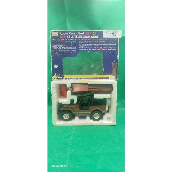 Vintage radio controlled Jeep NIB with remotoe control 9.5"