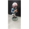 Image 1 : Heavy lawn jockey style football player statue 23" tall