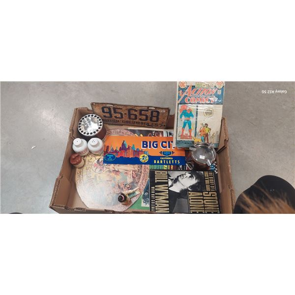 Box of vintage collectibles, 1957 license plate, Budweiser sign, 20 cent Superman comic, car show po
