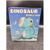 Image 2 : Dinosaur Bubble Gun for Ages 3+ with Music, Light, and Bubble Features