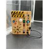 Image 1 : Electronic Circuit Board With Various Indicator Lights and Switches