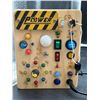 Image 2 : Electronic Circuit Board With Various Indicator Lights and Switches