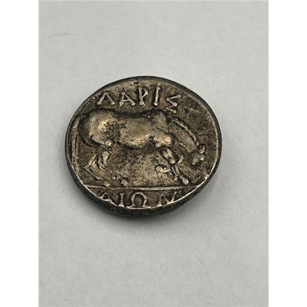 Ancient Greek Silver Coin with Bull and Face Motifs year unknown