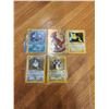 Image 1 : 5 Pokemon Cards (4) Holo & (1) Pikachu 1st Movie Card.