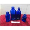 Image 1 : 4 assorted cobalt blue medicine bottles 