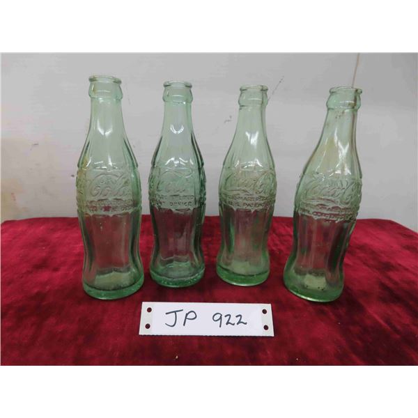 4 green color glass "coke" bottles- 1940s 