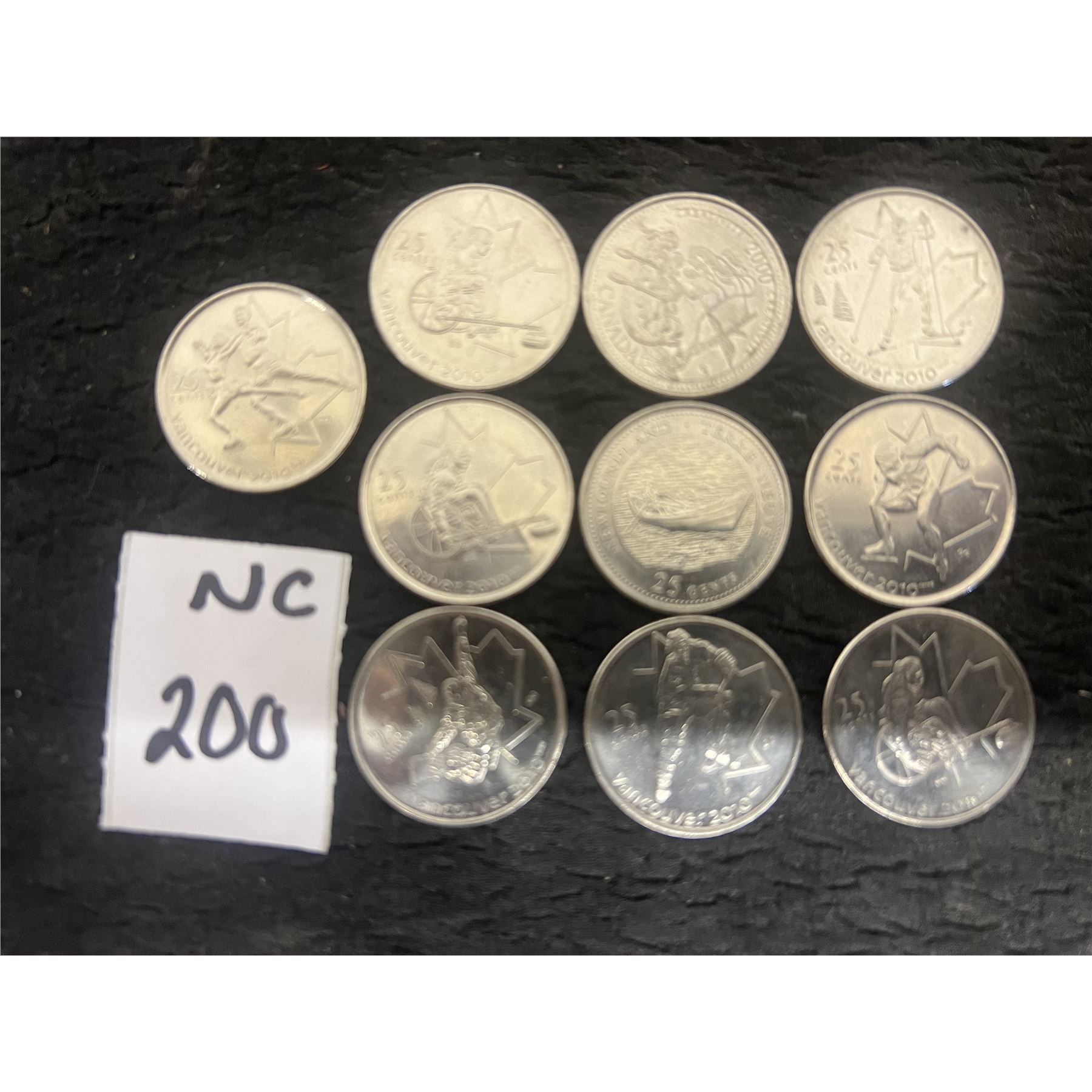 Vancouver 2010 Olympic Quarters and Loonie Set - Beck Auctions Inc. 2010 olympic quarters