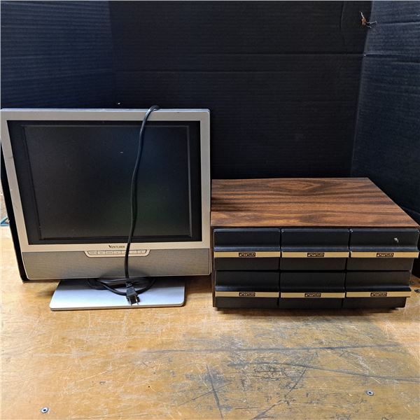 Cassete storage and a small tv 14" wide