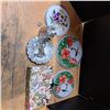 Image 1 : 50 cent canada coin and tin lids with flower art