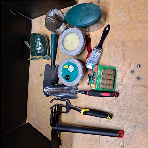 gardening tools and candles