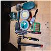 Image 1 : gardening tools and candles
