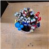 Image 2 : cement vase with knitting needles